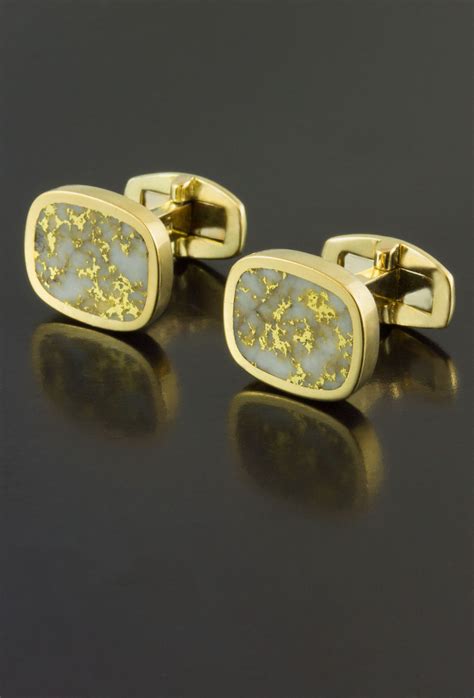 Gold cufflinks with gemstones 